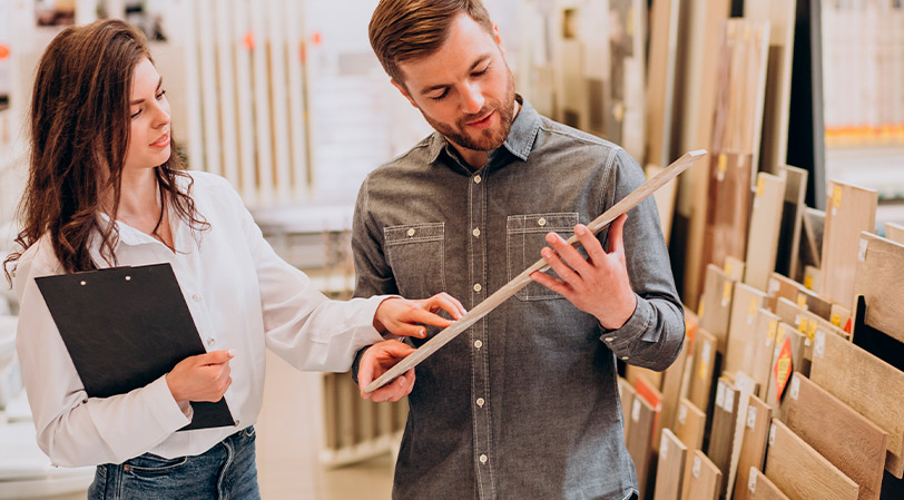 man receiving consultation about home building design